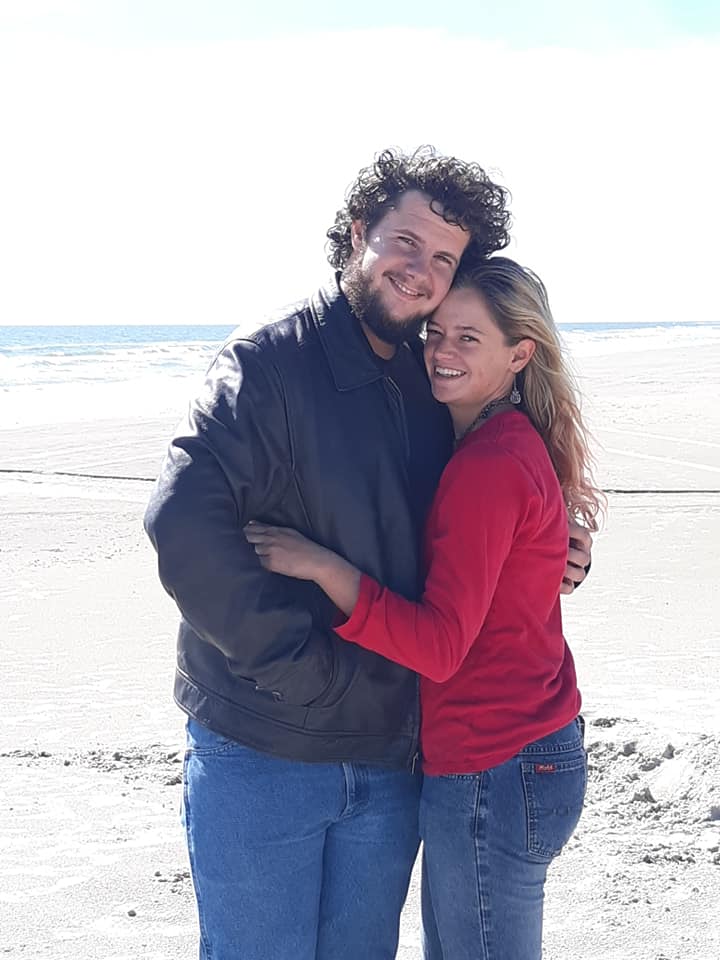My wife and I enjoying the ocean.